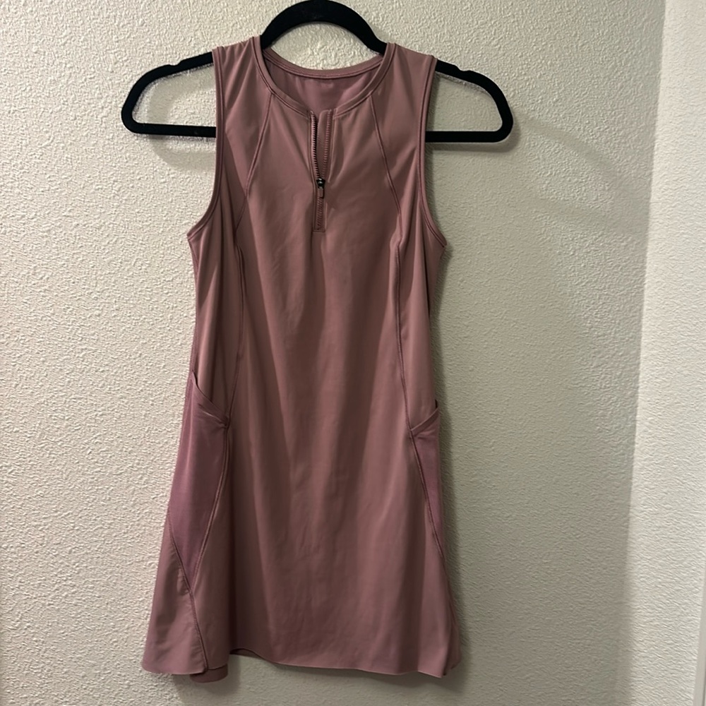 Athleta rose colored tennis dress with raw edge hem